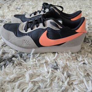 Nike Black and Gray Sneakers with Orange Swoosh